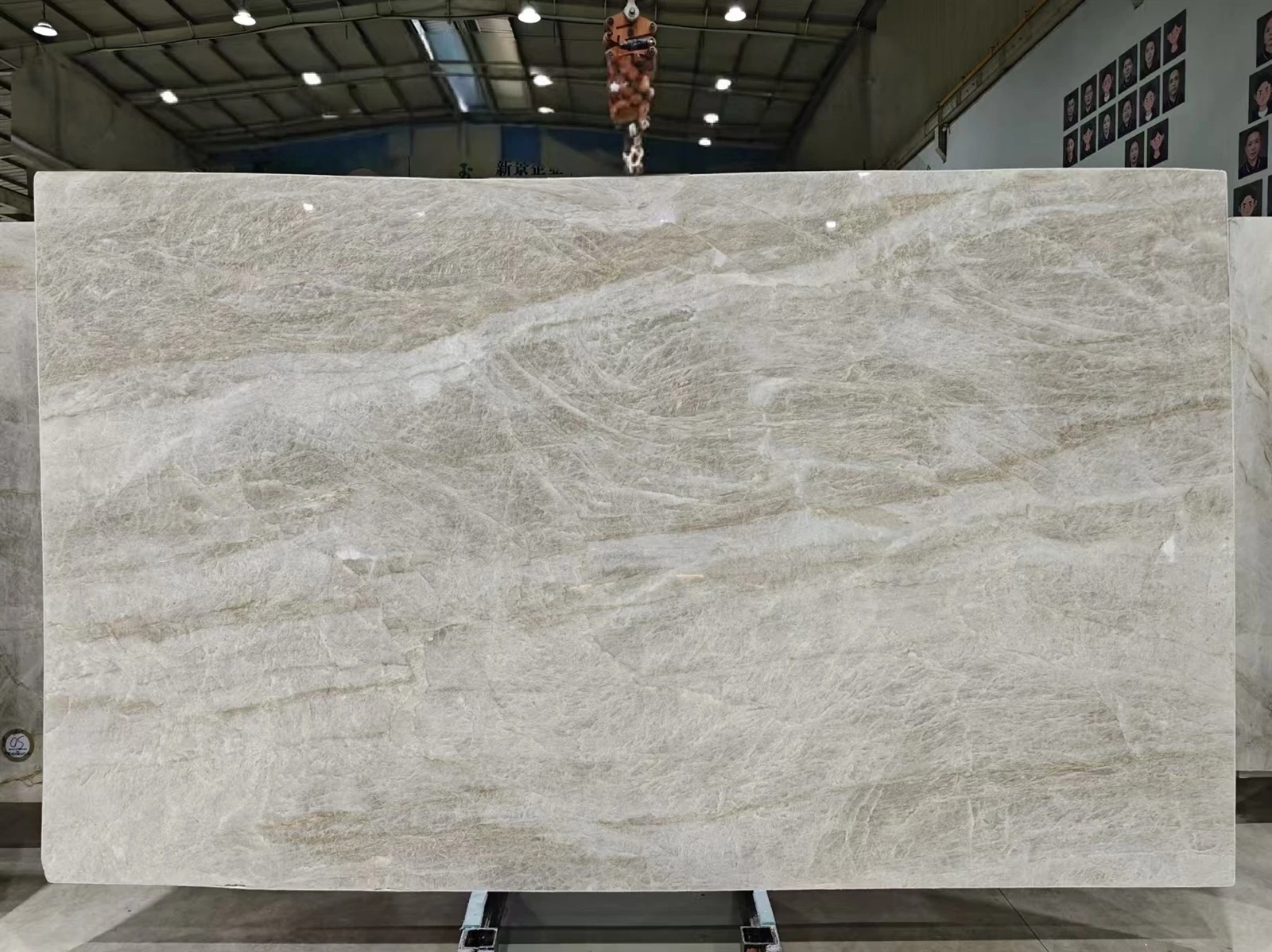 Full Taj Mahal Quartzite slab with a honed finish, warm off-white background and layered gray-beige natural movement. Full Taj Mahal Quartzite slab with a honed finish, warm off-white background and layered gray-beige natural movement.